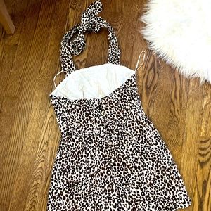 Never worn cheetah print romper. Shein. Size small. In great condition.